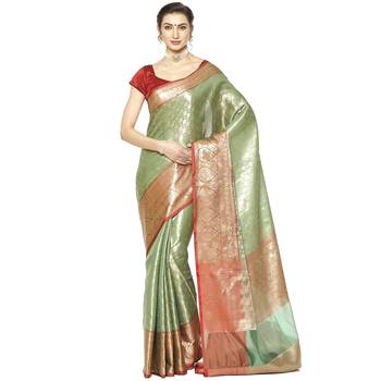 Green woven Faux kanchipuram silk saree with blouse 1
