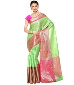 Green woven kanchipuram silk saree with blouse