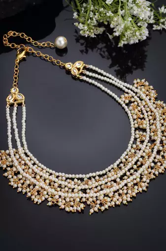 Gold pearl necklaces