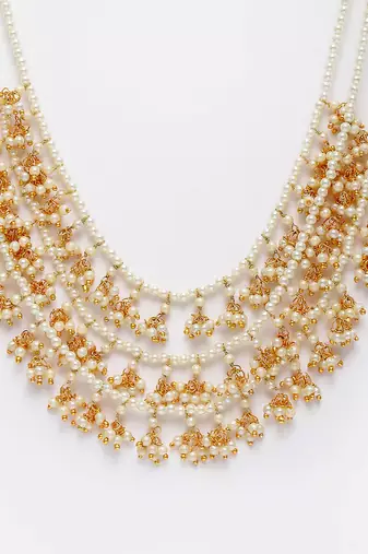 Gold pearl necklaces