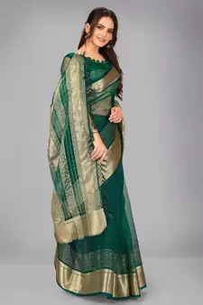 Green woven silk saree with blouse