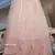 Peach Thread and sequence Embroidered with all over pearl rivet stud pasting net Semi Stitched bridal lehenga