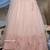 Peach Thread and sequence Embroidered with all over pearl rivet stud pasting net Semi Stitched bridal lehenga