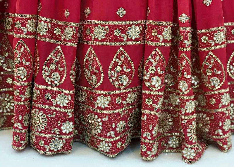 Mesmerizing Red Colored Digital Printed Embellished With Sequins, Zari And Foil Mirror Work Georgette Party Wear Gown