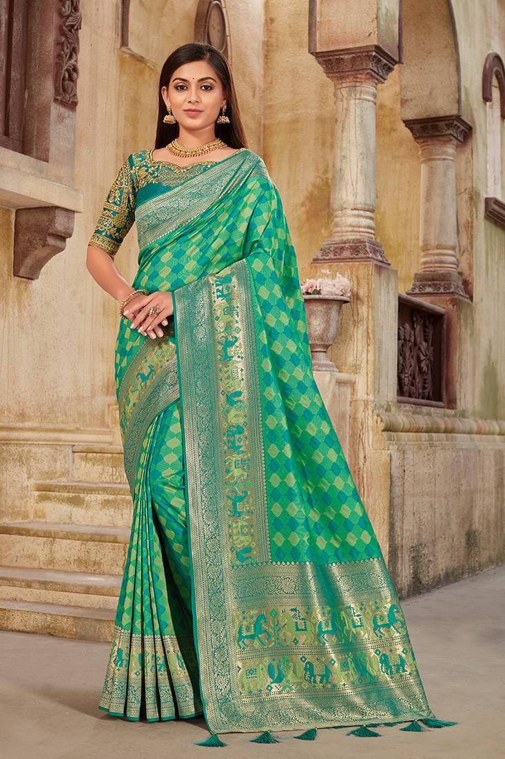 light sea green woven banarasi silk saree with blouse