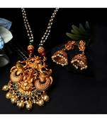 Antique Matte Gold Finish Goddess Laxmi Green Stone Studded Temple Jewellery set