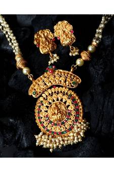Antique Matte Gold Finish Goddess Laxmi Green Stone Studded Temple Jewellery set