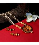 Antique Matte Gold Finish Goddess Laxmi Green Stone Studded Temple Jewellery set