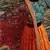 Fetching Yellow, Red and Green Colored Zari & Sequins Embroidered Taffeta Silk Semi Stitched Wedding Lehenga