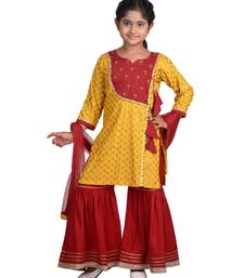 Yellow Floral Printed  Kurti with embroidered yoke work and Red Sharara and dupatta