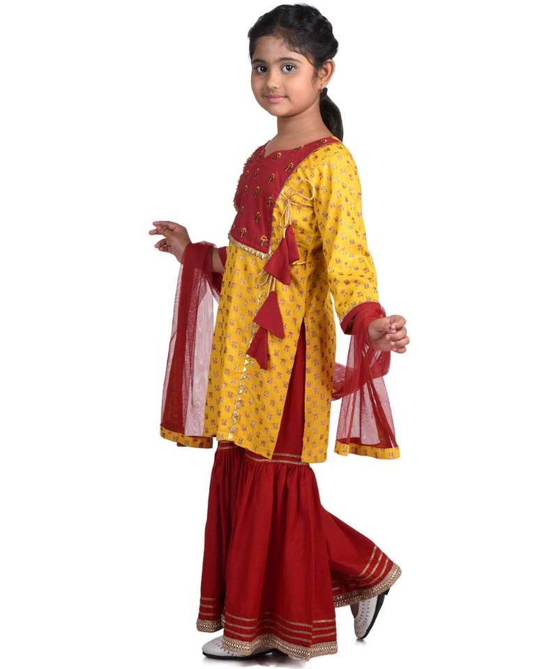 Yellow Floral Printed  Kurti with embroidered yoke work and Red Sharara and dupatta
