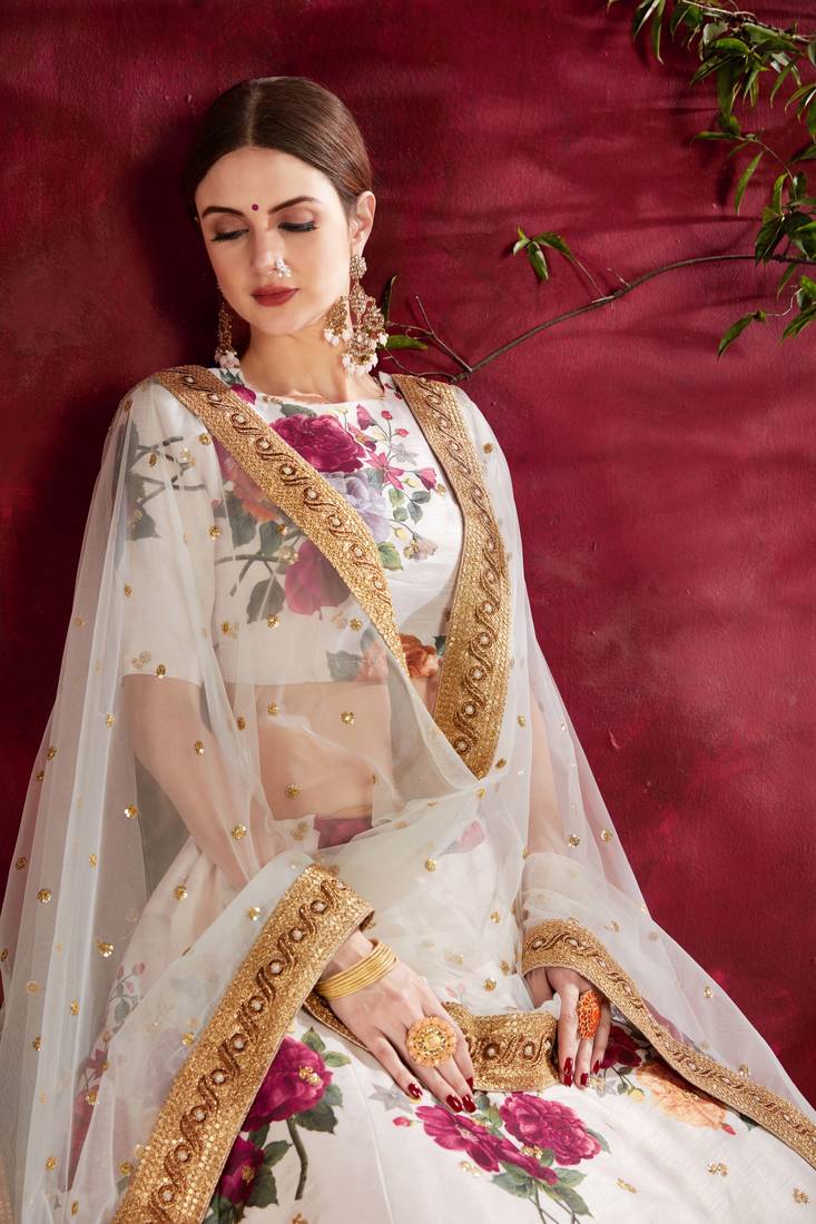Cream Pearl Dori And Sequins Embroidered Art Silk Lehenga Choli For Festival