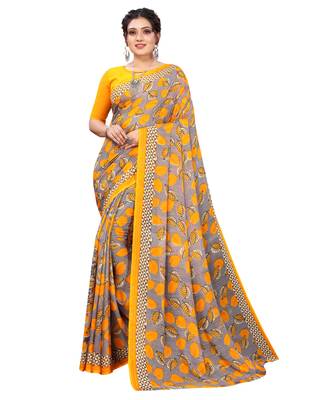 Yellow printed faux georgette saree with blouse 1