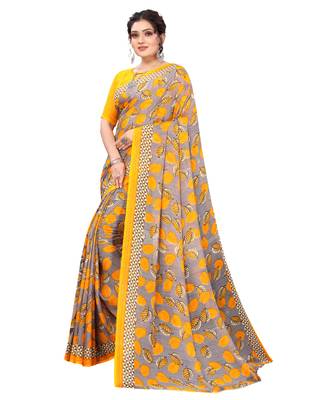 Yellow printed faux georgette saree with blouse 3