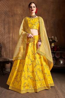 Prepossessing Yellow Dori, Zari, Thread and Glitter Sequins Embroidered Mulbury Silk Semi Stitched wedding Lehenga