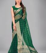 Green woven silk saree with blouse