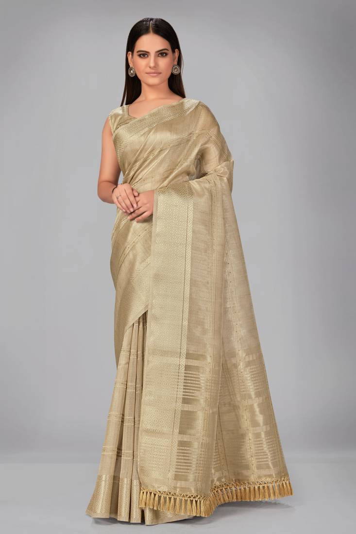 Beige woven silk saree with blouse
