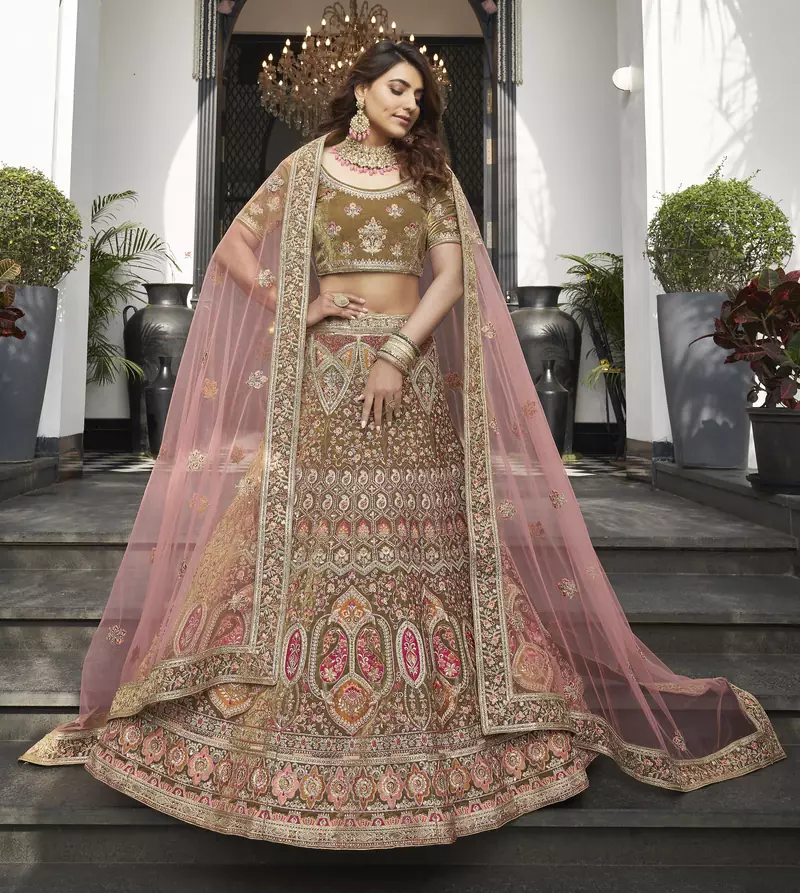 Olive green zarkan, thread, zari, dori, and sequins embroidered velvet semi stitched lehenga