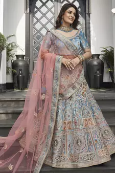 Turquoise zarkan, thread, zari, dori, and sequins embroideredvelvet semi stitched lehenga