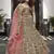Olive green zarkan, thread, zari, dori, and sequins embroidered velvet semi stitched lehenga