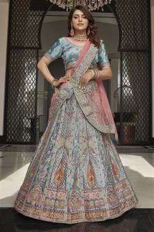 Turquoise zarkan, thread, zari, dori, and sequins embroidered velvet semi stitched lehenga