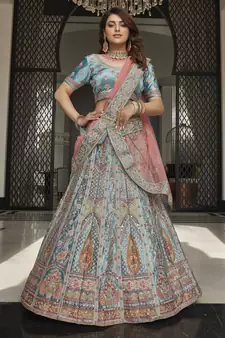 Turquoise zarkan, thread, zari, dori, and sequins embroidered velvet semi stitched lehenga