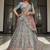 Turquoise zarkan, thread, zari, dori, and sequins embroidered velvet semi stitched lehenga