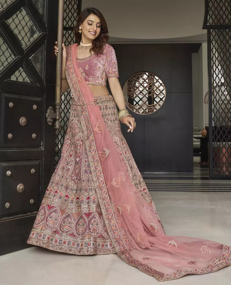 Mauve zarkan, thread, zari, dori, and sequins embroidered velvet semi stitched lehenga