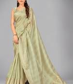 Light green woven silk saree with blouse