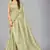 Light green woven silk saree with blouse