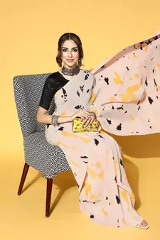 Cream printed satin saree with blouse