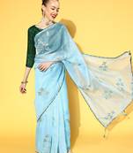 Sky blue printed organza saree with blouse