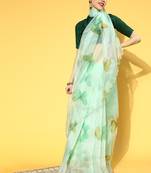 Light parrot green printed organza saree with blouse
