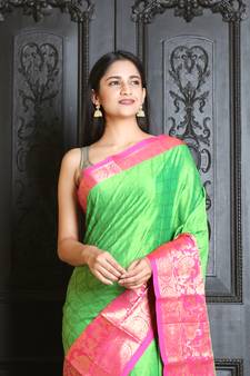 Light green woven silk blend saree with blouse