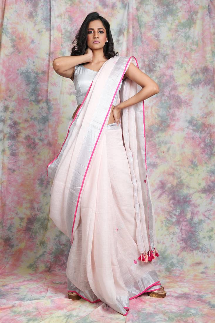 Light baby pink woven pure linen saree with blouse
