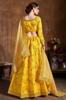 Prepossessing Yellow Dori, Zari, Thread and Glitter Sequins Embroidered Mulbury Silk Semi Stitched wedding Lehenga