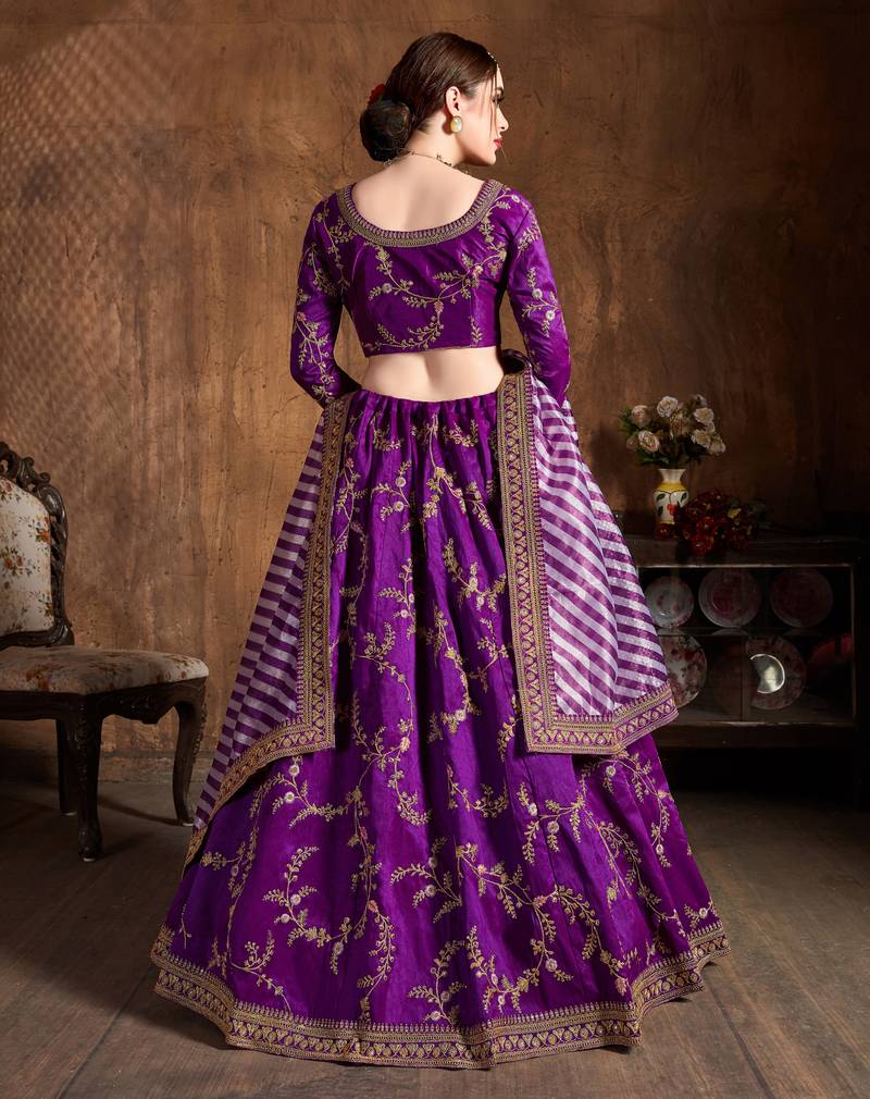 Hypnotizing Purple Dori Zari Thread And Glitter Sequins Embroidered Mulberry Silk Party Wear Lehenga Choli