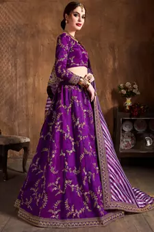 Hypnotizing Purple Dori Zari Thread And Glitter Sequins Embroidered Mulberry Silk Party Wear Lehenga Choli