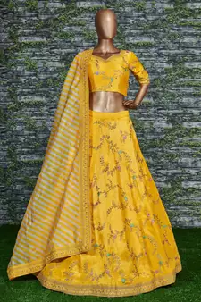 Prepossessing Yellow Dori, Zari, Thread and Glitter Sequins Embroidered Mulbury Silk Semi Stitched wedding Lehenga