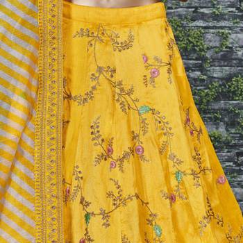 Prepossessing Yellow Dori, Zari, Thread and Glitter Sequins Embroidered Mulbury Silk Semi Stitched wedding Lehenga 9