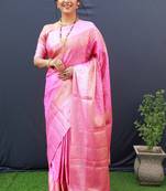 Pink woven kanchipuram silk saree with blouse