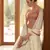 Beige Embellished Mukaish work Georgette semi stitched lehenga