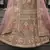 Olive green zarkan, thread, zari, dori, and sequins embroidered velvet semi stitched lehenga