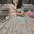 Turquoise zarkan, thread, zari, dori, and sequins embroideredvelvet semi stitched lehenga