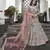 Turquoise zarkan, thread, zari, dori, and sequins embroideredvelvet semi stitched lehenga