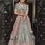 Turquoise zarkan, thread, zari, dori, and sequins embroidered velvet semi stitched lehenga
