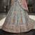 Turquoise zarkan, thread, zari, dori, and sequins embroidered velvet semi stitched lehenga