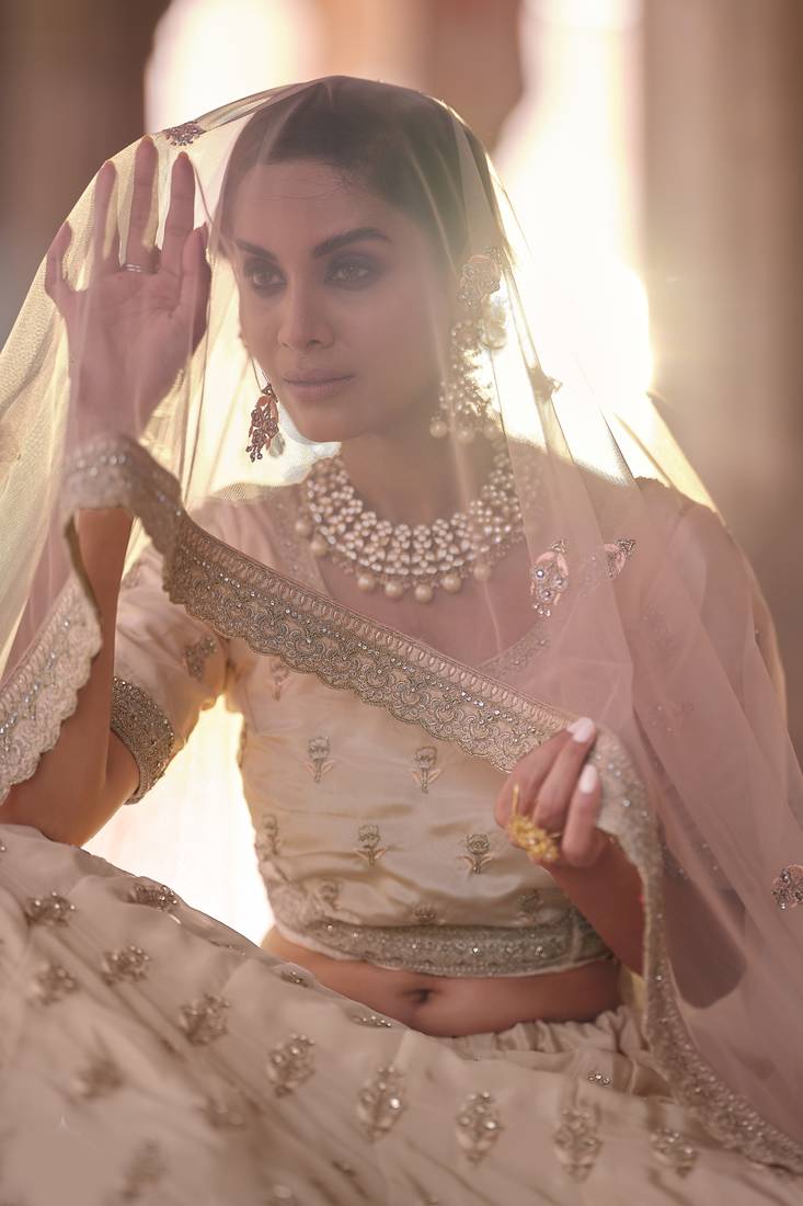 Beauteous Peach thread embroidered with zarkan crepe Silk Wedding Lehenga