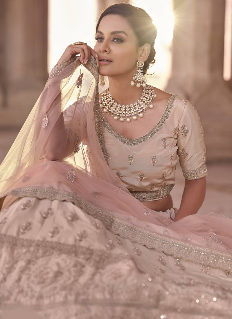 Beauteous Peach thread embroidered with zarkan crepe Silk Wedding Lehenga
