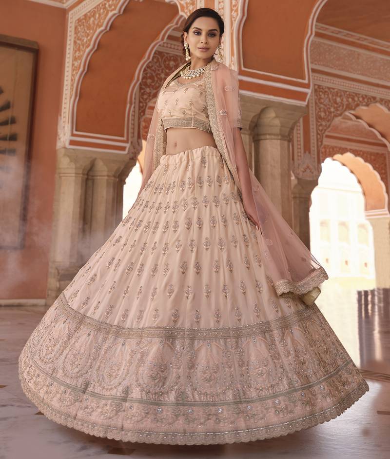 Beauteous Peach thread embroidered with zarkan crepe Silk Wedding Lehenga